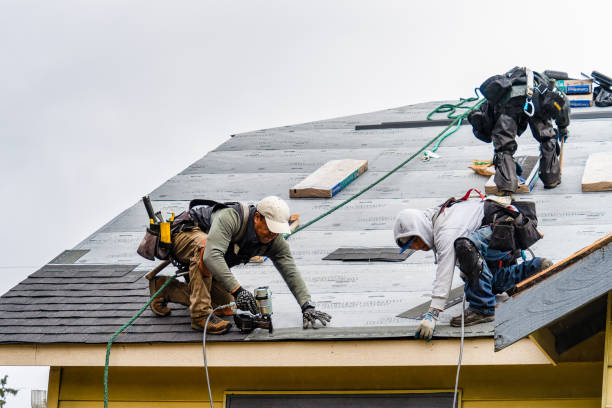 Professional Roofing technician working in Crowheart, WY